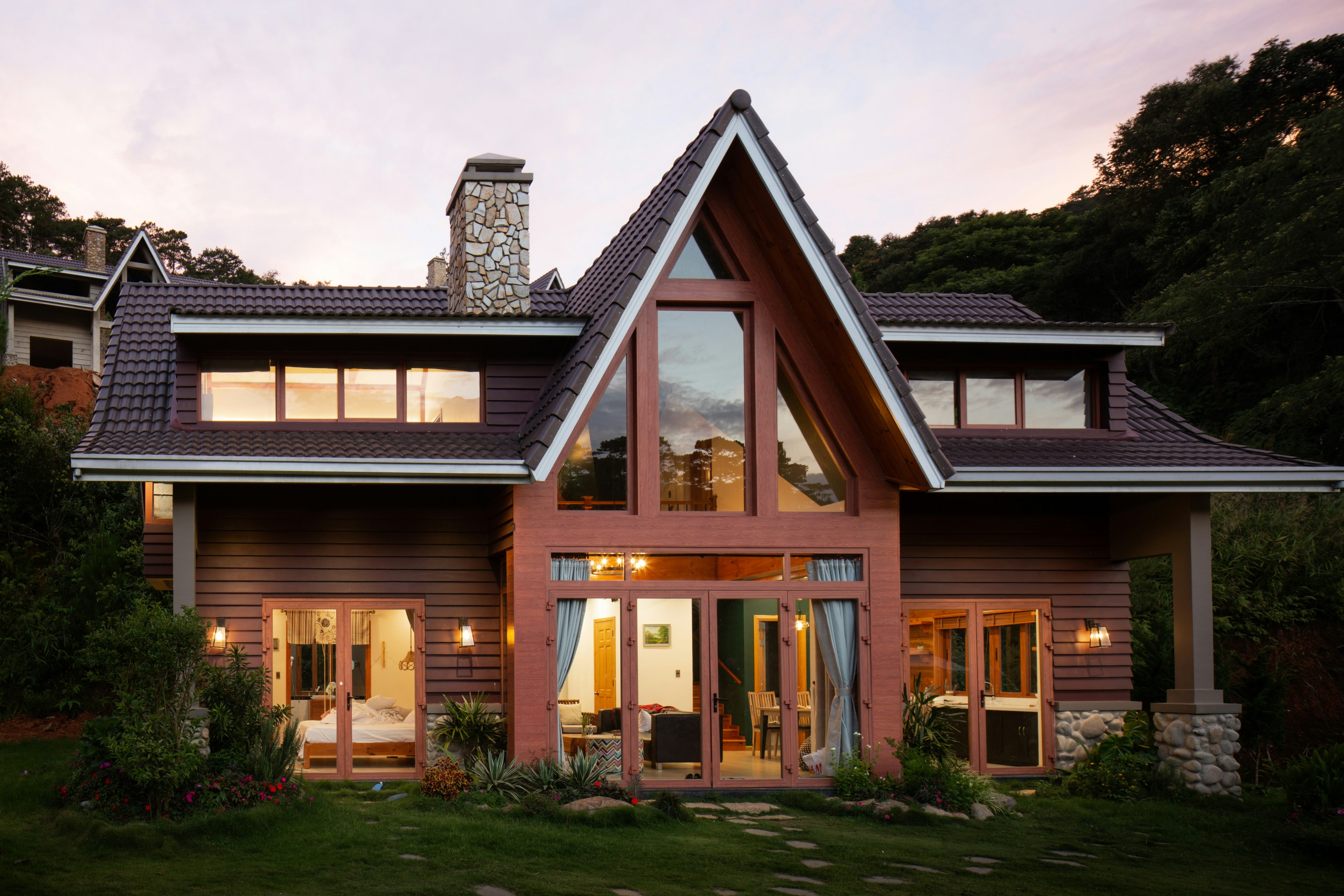 Modern house with large windows in winter setting - Professional window and door replacement in Montgomery and Bucks County PA